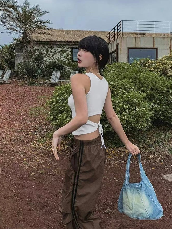 後背鏤空綁帶削肩背心￼